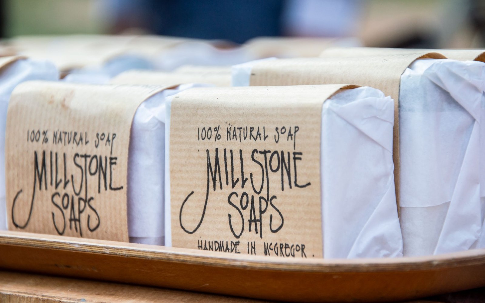 An original Ivory Soap cake in its 1879 packaging, shot flat on parchment ground