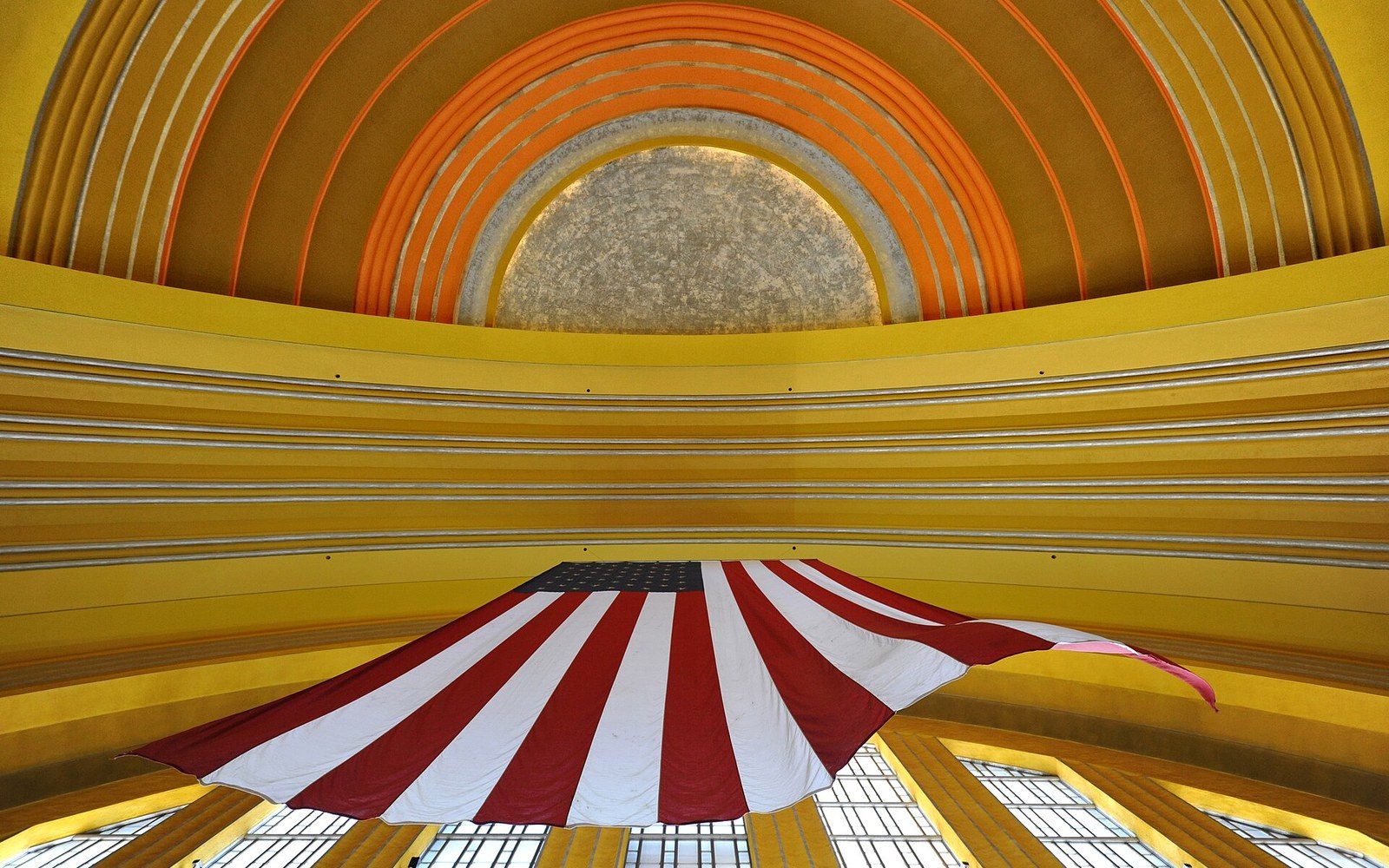Winold Reiss mosaic detail from Union Terminal rotunda, individual glass tesserae visible, industrial scene fragment